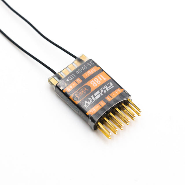 FlySky Tr8B Mini Rx 8CH, a small black and orange remote control receiver with dual antennas and a connected wire.