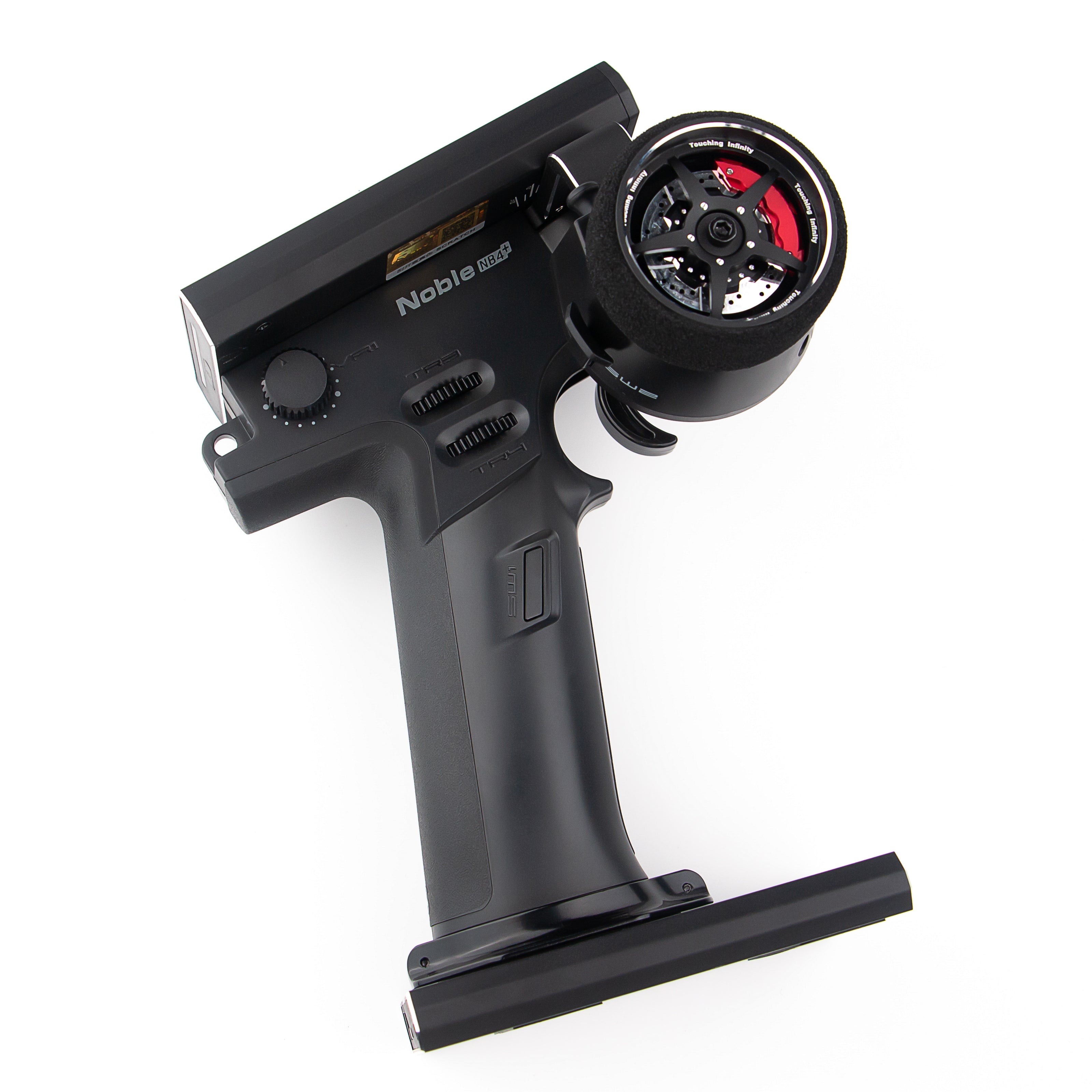 Top view of FLYSKY Noble NB4+ radio with red-accented wheel, control dials