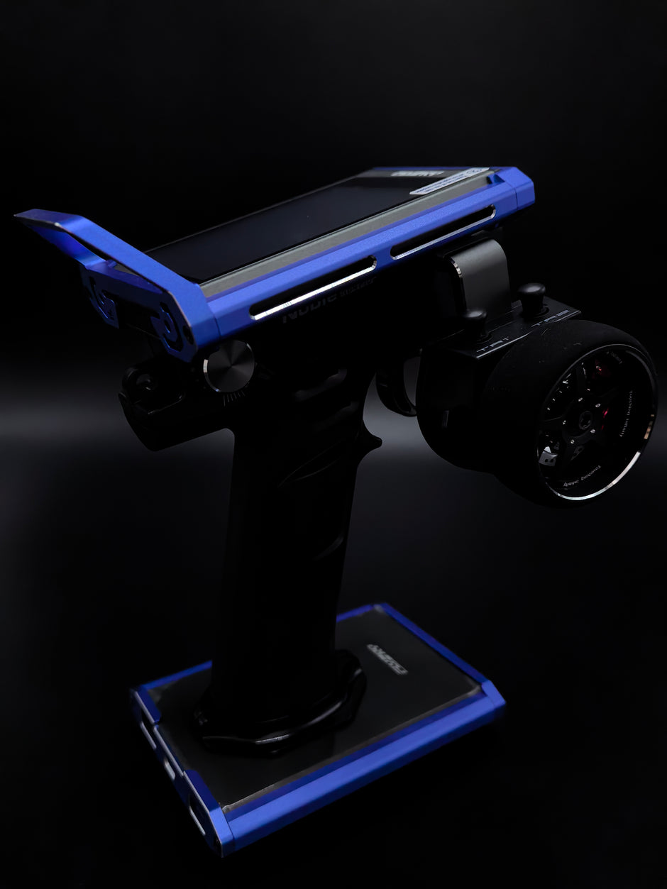 Robotic arm with a smartphone on a dark background
