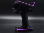 Black and purple stand with a phone holder on a dark background