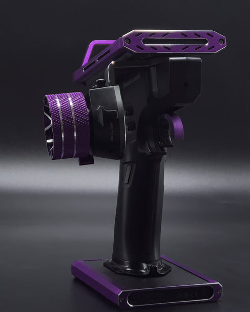 Black and purple camera stabilizer on a dark background