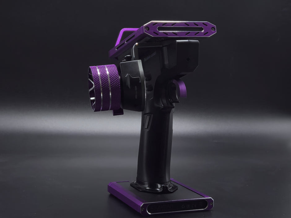 Black and purple camera stabilizer on a dark background