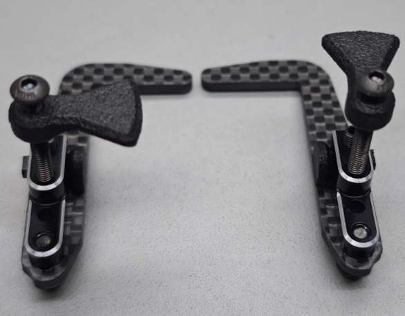 Black carbon fiber RC chassis upgrade set with adjustable battery mounts